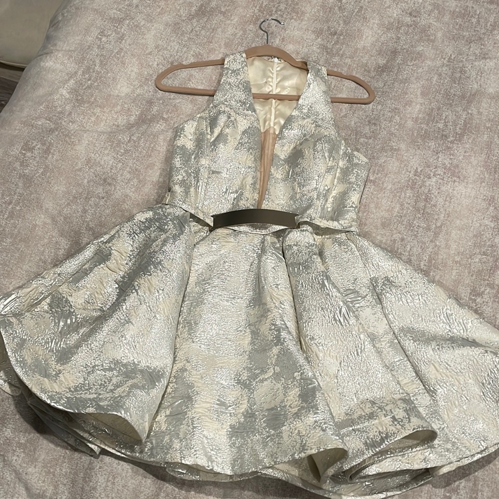 Beautiful baby doll dress ! Perfect for a wedding shower or even prom !